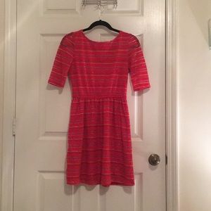 Red Elbow length fit-n-flare dress.